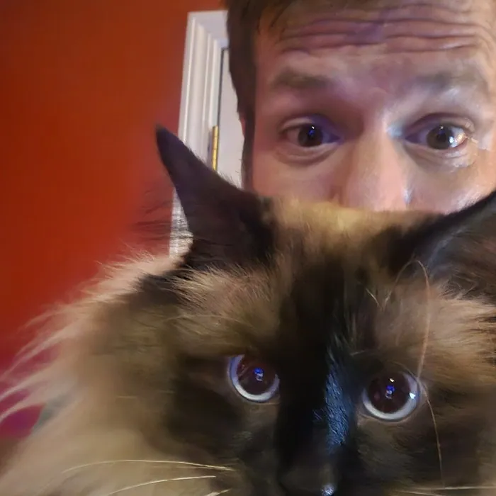 Jamison Todd Johnson with his cat.